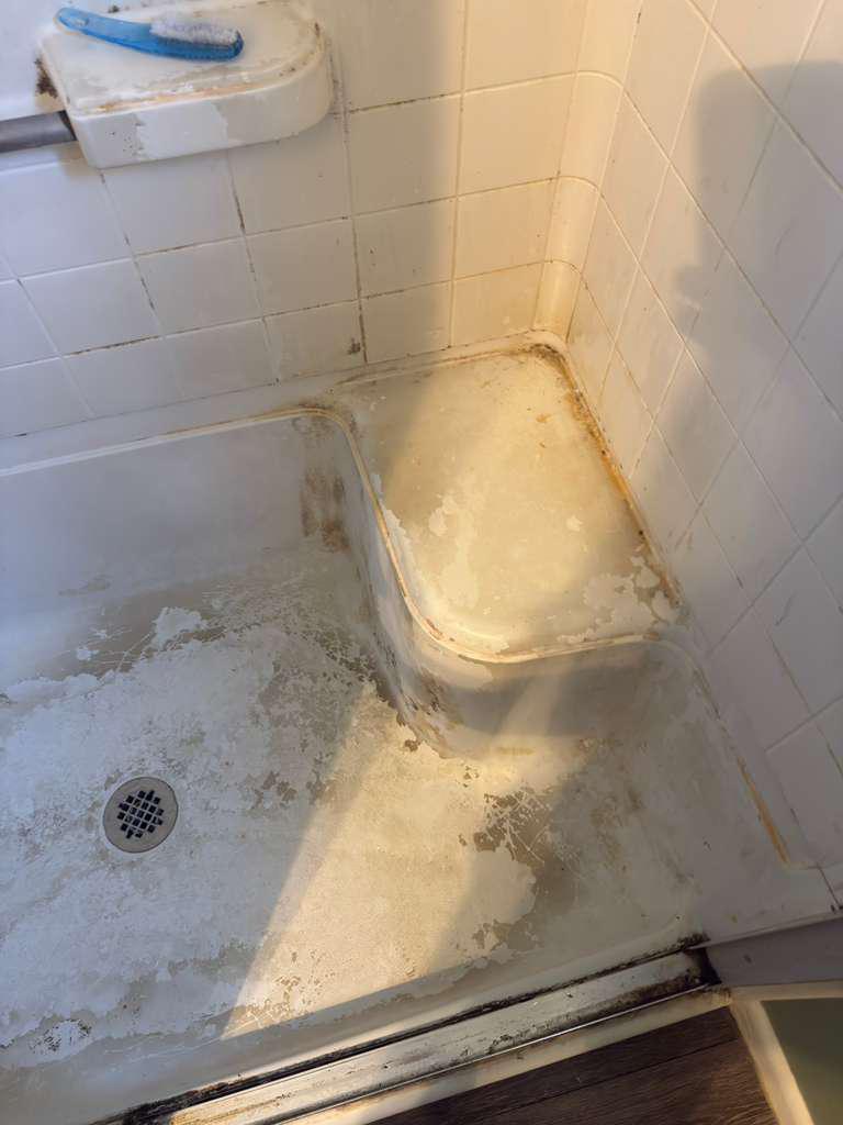 Before deep cleaning shower King of Prussia Montgomery County - years of soap scum mold buildup
